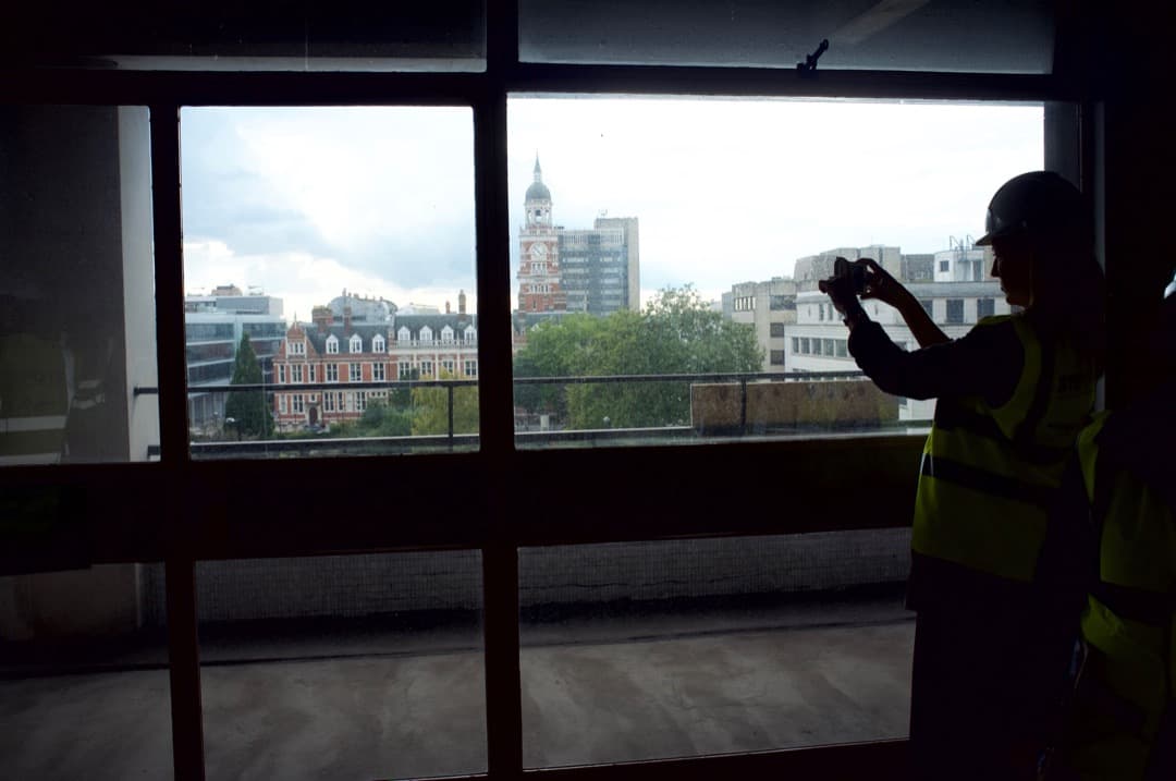 Photo of a balcony overlooking a town hall