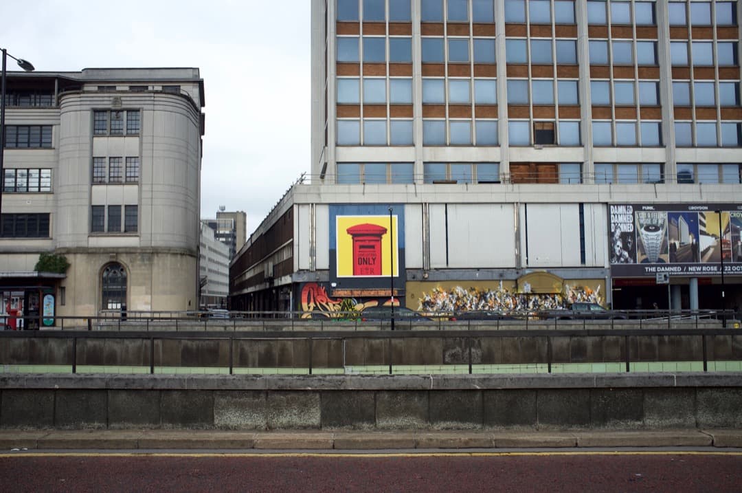 Photo of artwork on the side of a building